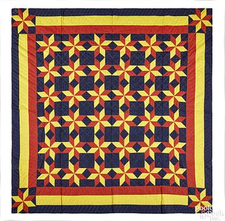 Vibrant pieced star pattern quilt