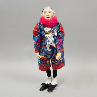 Toy Clown. Germany. 20th century. Steiff. Made in cloth. With base, brand button, and label. Dressed in multi-colored suit.