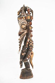 A Sepik River Tribe Carved Wood Ancestor Figure, Papua New Guinea, 20th Century,