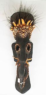 A Carved Wood and Cowrie Shell Boar Mask, East Sepik, Papua New Guinea, 20th Century.