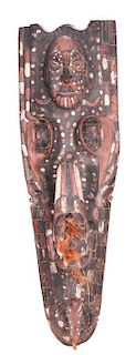 A Sepik River Region Painted Carved Hardwood Mask, Papua New Guinea, 20th Century.