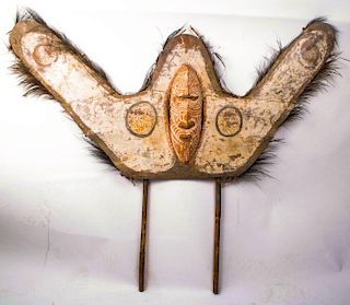 A Carved and Painted Wood Emblem from a War Canoe, Papua New Guinea, 20th Century,