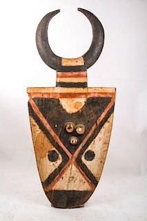 A Nafana Bedu Carved Wood Plank Mask, Ivory Coast, 20th Century.