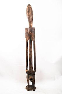 A Senufo Tribe Carved Wood Rhythm Pounder, Debele, Ivory Coast, 20th Century.