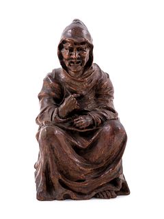 A Gothic Revival Carved Oak Figure