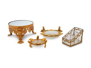 Four French Gilt Metal and Glass Table Articles