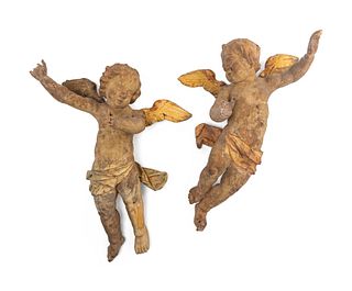 A Pair of Italian Carved Cherub Figures
