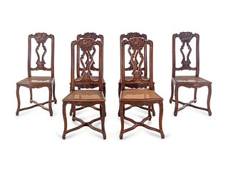 A Set of Six Italian Carved Oak Dining Chairs