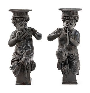 A Pair of Cast Metal Figures of Musical Fauns