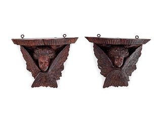 A Pair of Continental Carved Oak Brackets
