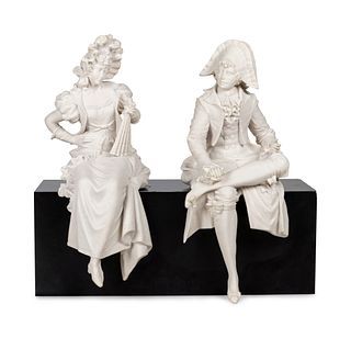A Pair of Composition or Resin "Column Sitter" Figures