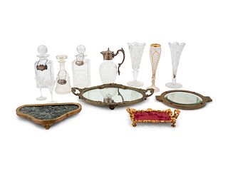 Four Gilt Metal Mounted Table Plateaus and a Group of Cut Glass Articles