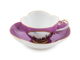 A Meissen Painted and Parcel Gilt Porcelain Teacup and Saucer