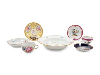 Seven Meissen Painted and Parcel Gilt Porcelain Table Articles
