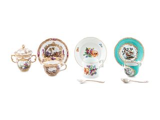 Three Meissen Painted and Parcel Gilt Porcelain Cup and Saucer Sets, a Covered Cup and Two Spoons