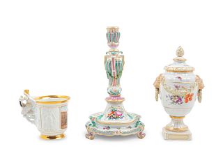Two Berlin (K.P.M.) Porcelain Articles and a Meissen Painted and Parcel Gilt Candlestick