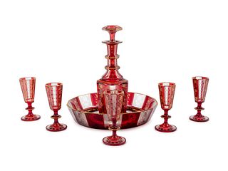 A Bohemian Gilt Decorated Ruby Cut-to-Clear Glass Liquor Set