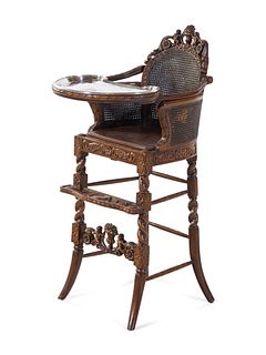 A Rococo Revival Carved Wood High Chair with a Fitted American Silver-Plate Tray