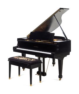 A Kawai Black Lacquered Baby Grand Piano