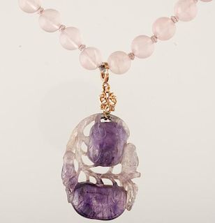 A Carved Amethyst Pendant and Rose Quartz Necklace 