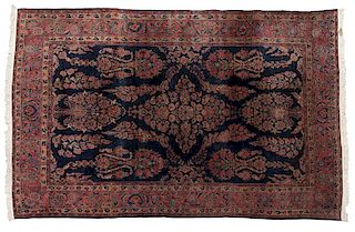 A Persian Sarouk woolen rug