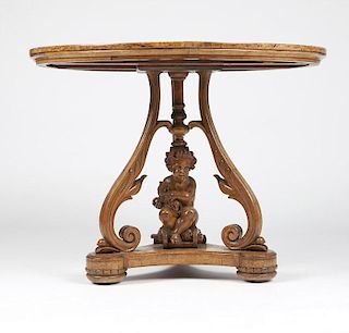 An Italian marquetry birdseye maple parlor table