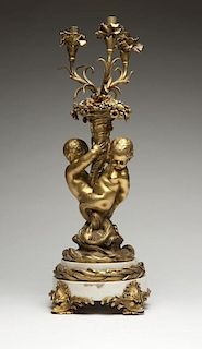 A French gilt bronze and marble candelabrum