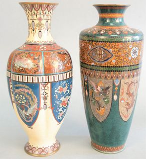 Two Japanese cloisonne vases, one having ribbed body with butterfly, birds of paradise and dragon decoration along with green vase having panels of ph