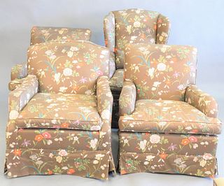 Group lot of 4 upholstered club chairs having tan with flowers upholstery.