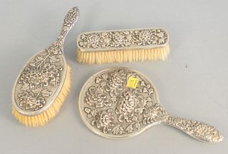 Three piece Chinese Export silver dresser set, lotus and blossoming flowers, marked L.W. & Hallmark.
