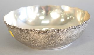 Large silver Persian bowl elaborately chase decorated with floral rim, Arabic mark on bottom, dia. 9 1/2".