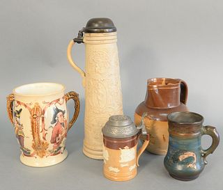 Five piece group to include Mettlach Loving cup, salt glazed stein, Dickens Ware weller along with 2 Doulton pieces, largest ht. 13".