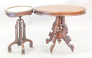 Two oval Victorian tables with inset marble, marble top 18" x 24", wood top 27" x 36".
