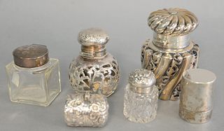 Group of 6 silver pieces to include 2 silver overlay bottles, 2 small inkwells with silver tops, silver cased pencil sharpener and a silver box openin