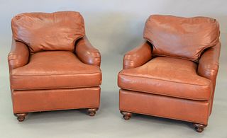 Pair of Baker leather easy chairs, ht. 28 1/2", wd. 33".