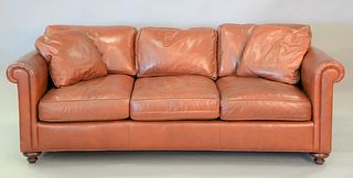 Baker leather upholstered three-cushion sofa, lg. 87".