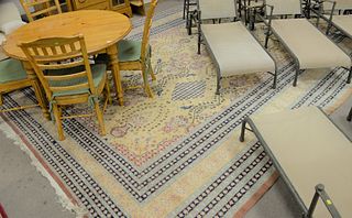 Oriental carpet, 12' 2" x 18' 8".