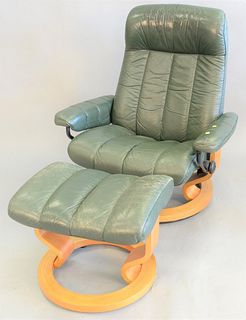 Ekornes Stressless lounge chair having green leather upholstery with ottoman.