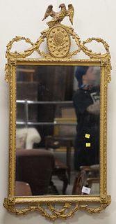 Federal gilt mirror, having eagle pediment and scrolling swag, 40" x 20".