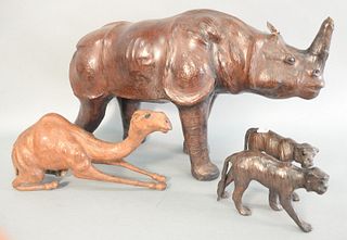 Four leather animals to include large rhino, ht. 14", lg. 24", pair of cats and a camel.
