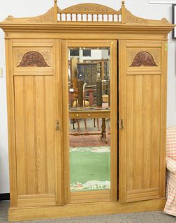 Three door pine armoire, having fitted drawers. ht. 91 in., wd. 68 in.