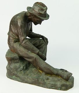 LARGE BRONZE SCULPTURE OF SEATED COAL MINER