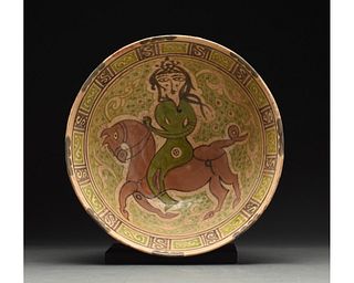 MEDIEVAL ISLAMIC TERRACOTTA PLATE WITH HORSEMAN
