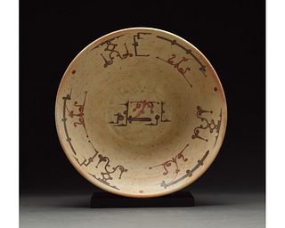 MEDIEVAL ISLAMIC TERRACOTTA PLATE WITH GEOMETRIC PATTERNS