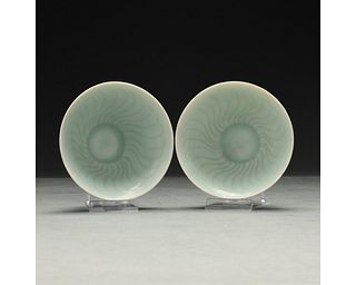 A PAIR OF CELADON-GROUND BOWLS, CHINA