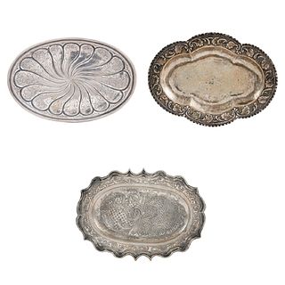 Lot of Three Trays, Mexico, 19th century, Chiseled, embossed and pressed silver