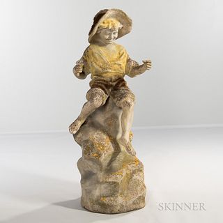 Stone Figure of a Boy on Rock