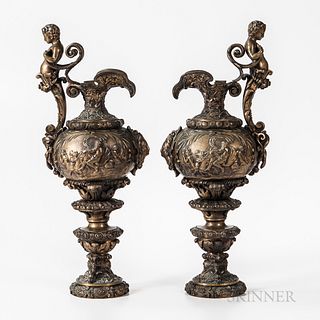 Pair of Mythological Decorated Bronze Ewers
