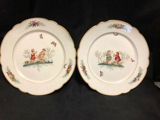 PAIR OF UNMARKED ANTIQUE HAND PAINTED PORCELAIN PLATES WITH CHILDREN