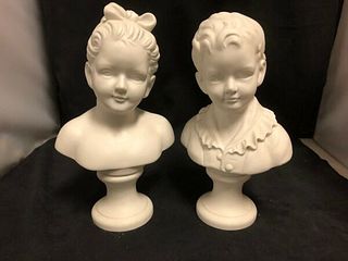 A PAIR OF BISQUE FIGURES- GIRL AND BOY BUSTS